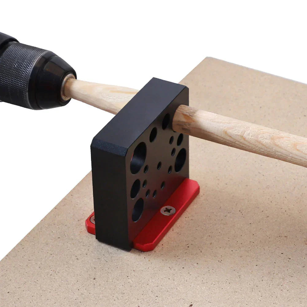 Drill guide tool for precise woodworking with adjustable hole sizes and secure red base