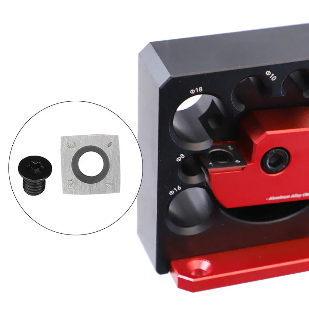 Precision woodworking tool with red and black components, featuring labeled hole sizes and a screw insert.