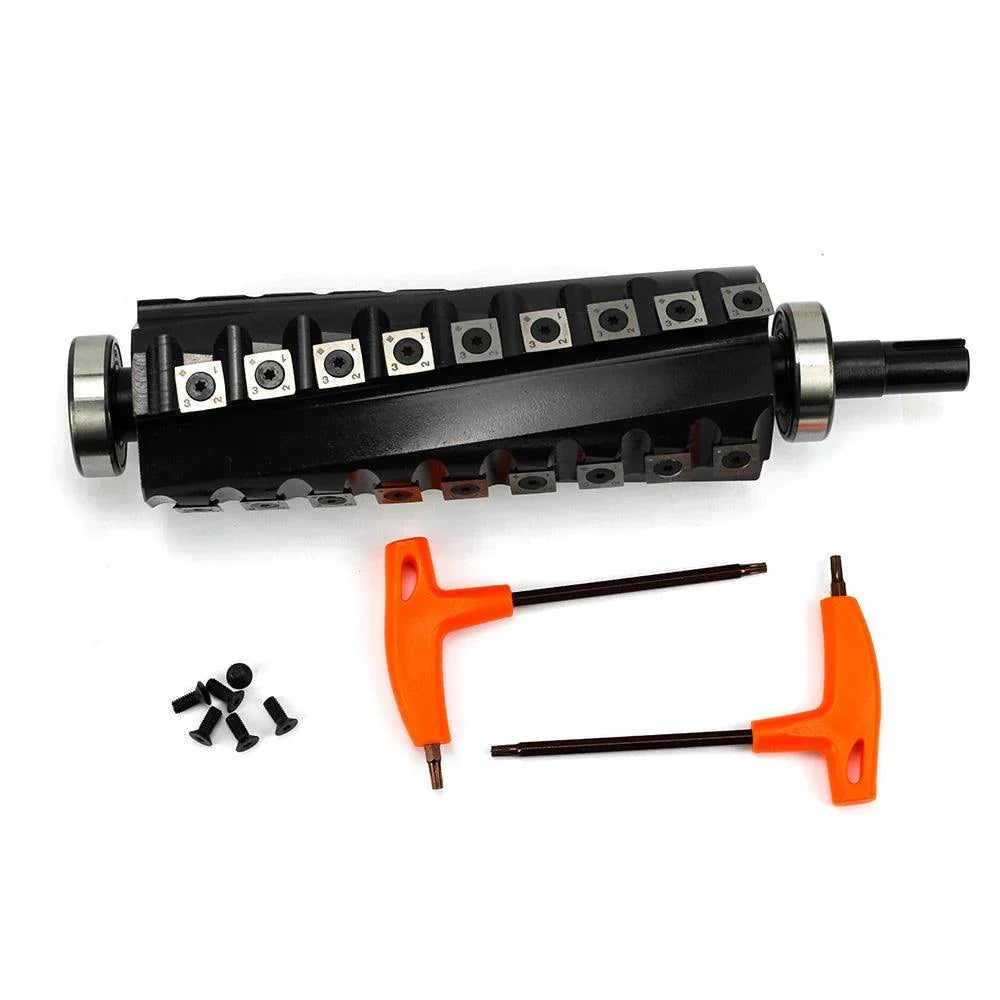 Black woodworking router bit with orange hex keys and screws for precision tool setup